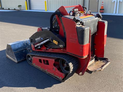 toro dingo mini skid steer trencher|toro dingo price new.